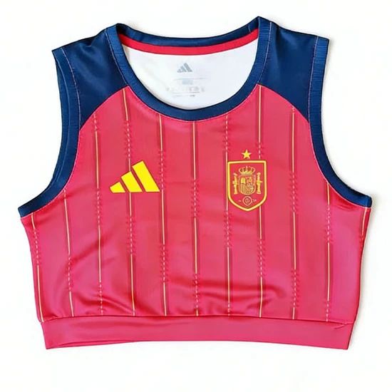 Pink sleeveless training cropped top with blue shoulders, featuring the Spain crest on the chest and a yellow Adidas logo.
