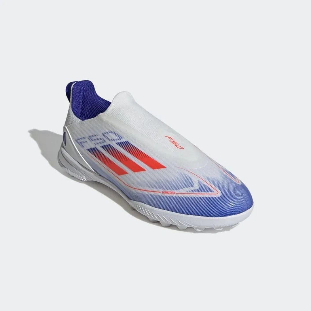 9fa65aca-aa1f-4022-801d-96460c17d53b | UAE SPORT STORE White slip-on soccer shoe with a blue heel collar and red side stripes, labeled F50 on the side