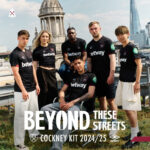 Six young athletes in black Betway jerseys stand on a rooftop with a city skyline behind them, promoting the Cockney Kit 2024/25.