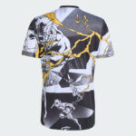 Men's short-sleeve T-shirt featuring black-and-white comic panels with yellow lightning accents and superhero illustrations.