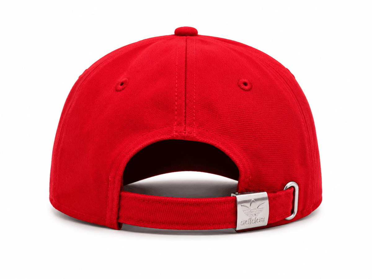 Red baseball cap shown from the back with an adjustable strap and metal buckle featuring the Adidas logo.