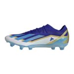 AD-1_0027_ID0710_4_FOOTWEAR_Photography_SideMedialCenterView_transparent | UAE SPORT STORE Blue and gold soccer cleat shown in a right-side profile with gradient sole and studs on the sole.