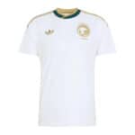 White Saudi national team soccer jersey with gold crest and Adidas logo on chest, short sleeves, green-gold collar trim.