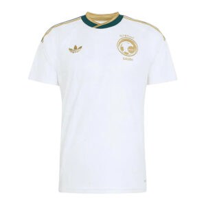 White Saudi national team soccer jersey with gold crest and Adidas logo on chest, short sleeves, green-gold collar trim.