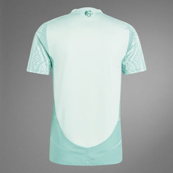 Back view of a mint green athletic jersey with patterned geometric sleeves