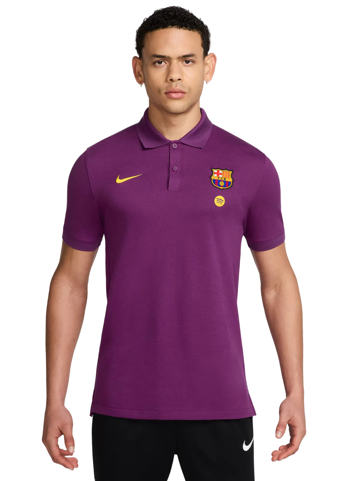 BM Model wearing a purple FC Barcelona polo shirt with Nike swoosh and Spotify badge against a white background.