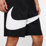 Black athletic shorts with a large white Nike swoosh graphic along the side of the leg.