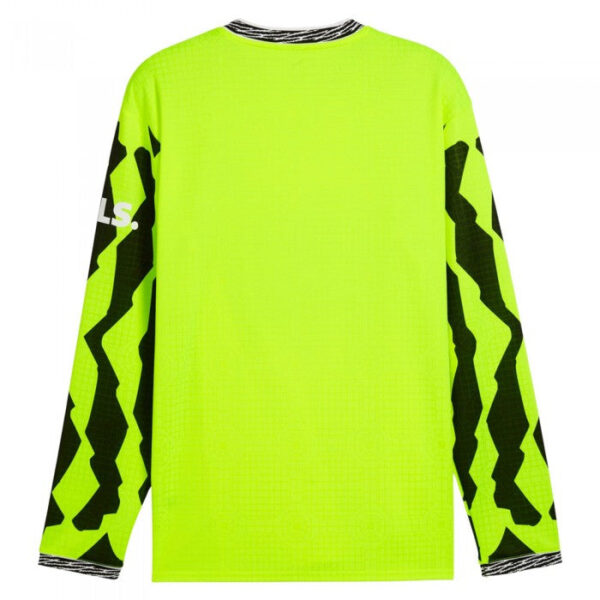 Neon yellow long-sleeve athletic jersey with black zigzag sleeve pattern on both arms