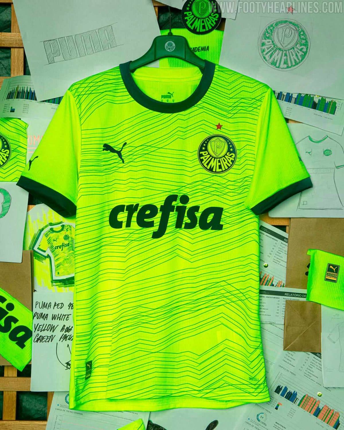 Bright neon Palmeiras goalkeeper jersey on a hanger, with crest, Puma logo, and 'crefisa' sponsor across the chest.