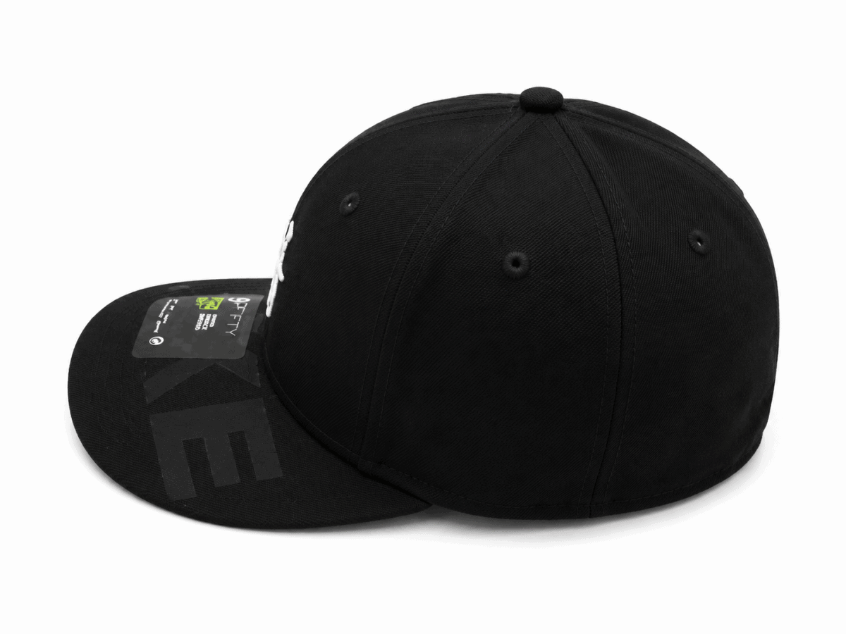 Black six-panel baseball cap with a curved brim, shown from a side angle. The top button and stitched panels are visible on a plain white background.