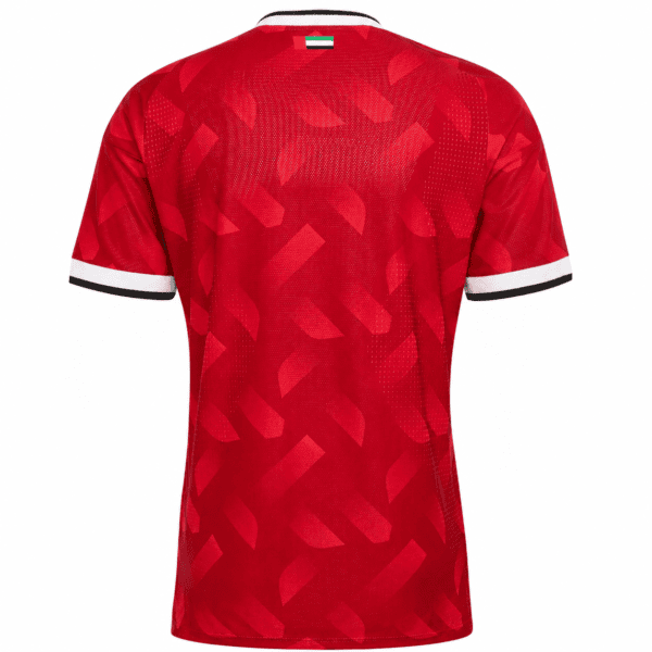 UAE national team away jersey 2026 in red with white and black sleeve accents.