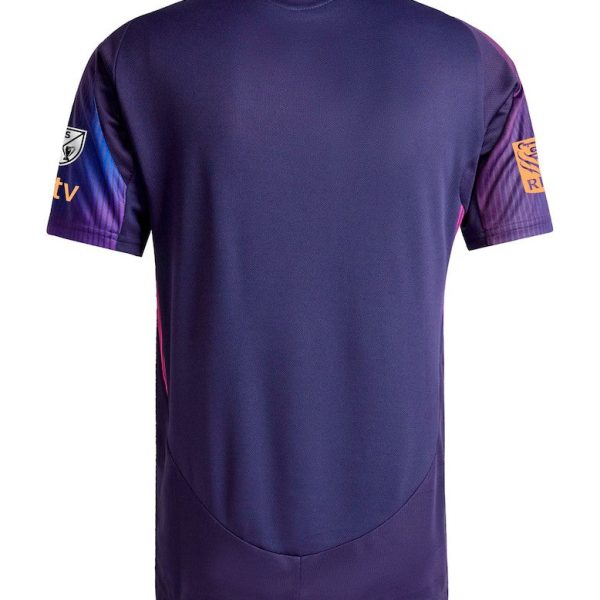 Back view of a purple athletic jersey with orange neckline logo 'LA', pink side panels, and sponsor logos on the sleeves.