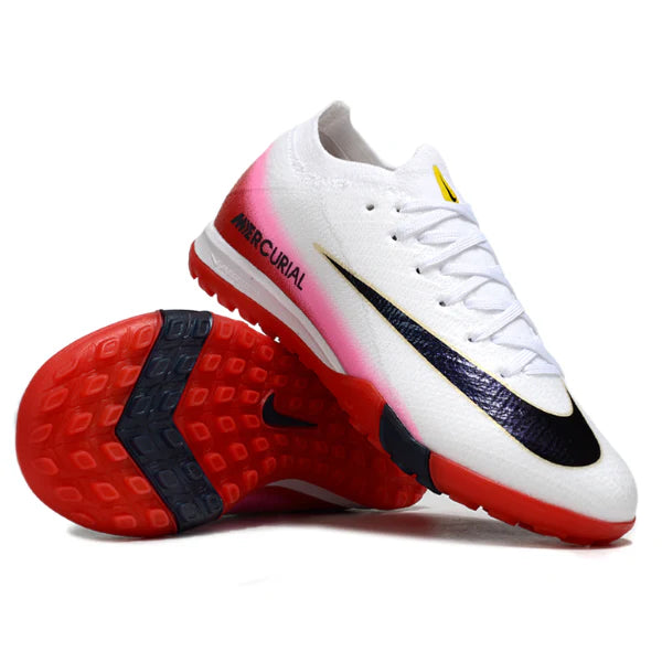 White Nike Mercurial soccer cleats with a pink gradient midsole, black swoosh, and red outsole shown in a dynamic angled view