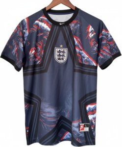 England national team jersey in dark blue with red abstract patterns and crest on the chest
