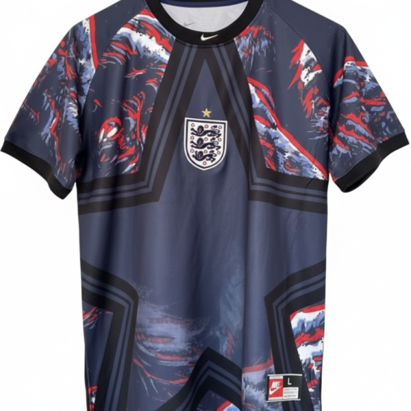 England national team jersey in dark blue with red abstract patterns and crest on the chest