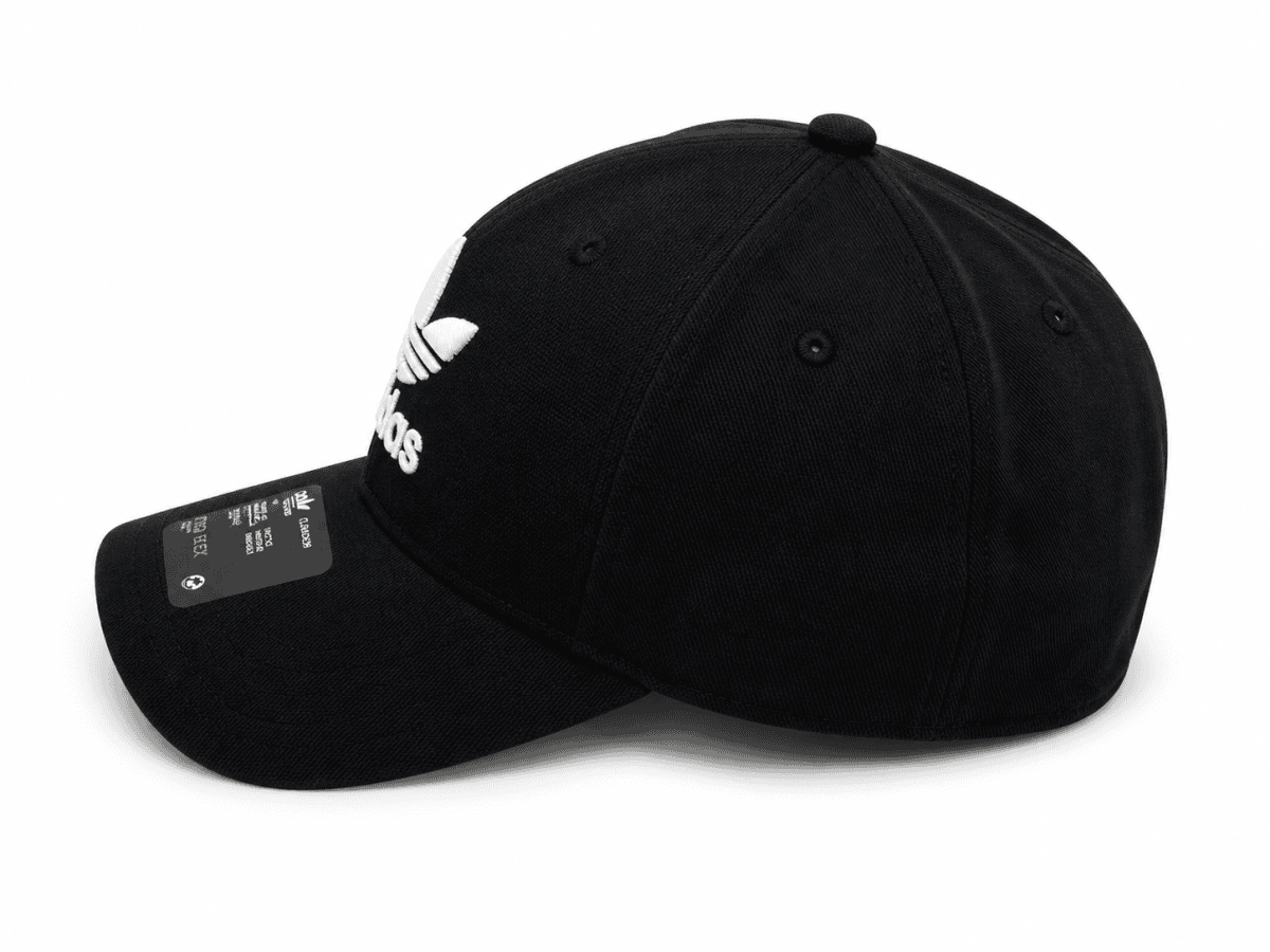 Black Adidas baseball cap with a white embroidered logo on the front, side view.