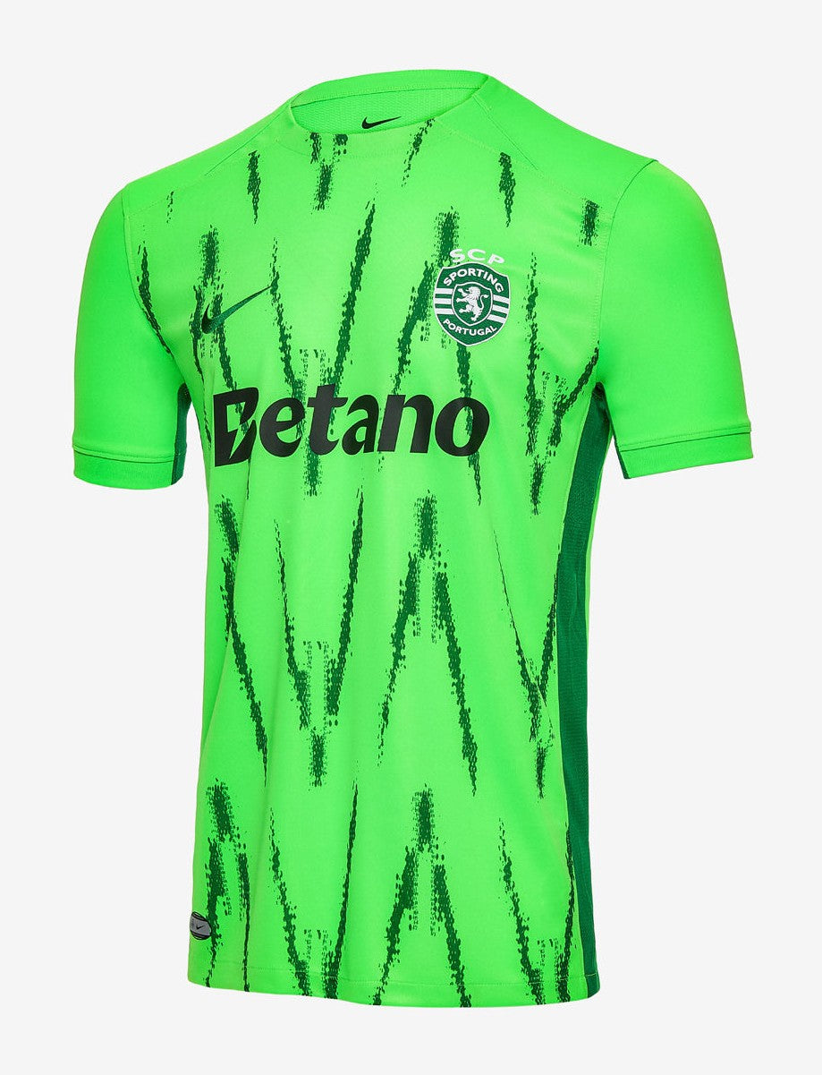 EMOjWQ4N19JCku5 | UAE SPORT STORE Bright green Sporting CP jersey with black slash pattern, Betano sponsor, Nike logo, and club crest.