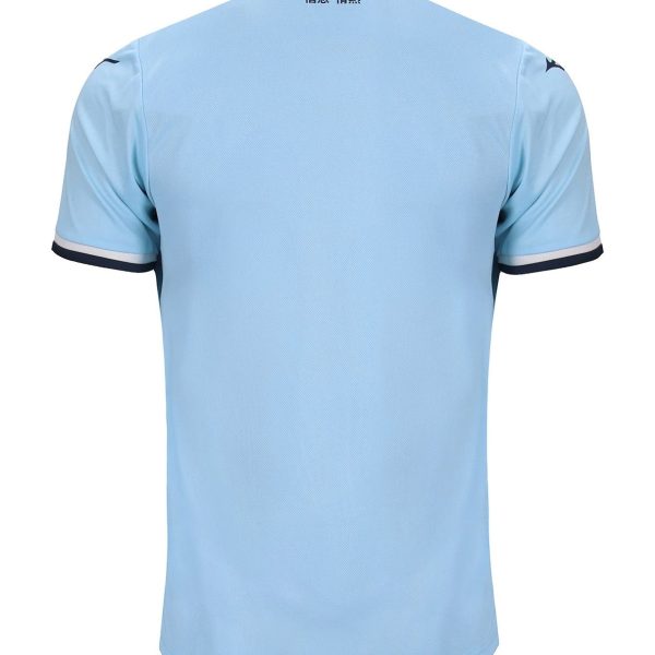 Back view of a light blue polo shirt with a white collar and dark navy sleeve cuffs.
