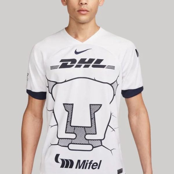 Front view of a man wearing a white graphic sports jersey with DHL logo and a large U-shaped design on the chest.