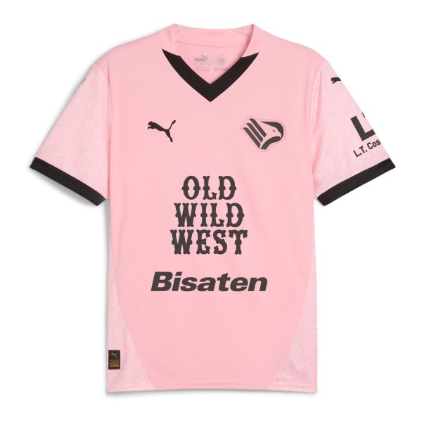 Pink sports jersey with black V-neck, Puma logos, and bold text 'OLD WILD WEST' on front; appears to be a football (soccer) jersey.