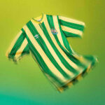Green and yellow striped football jersey with a crest and Umbro logo on a lime gradient background, appearing as if floating.