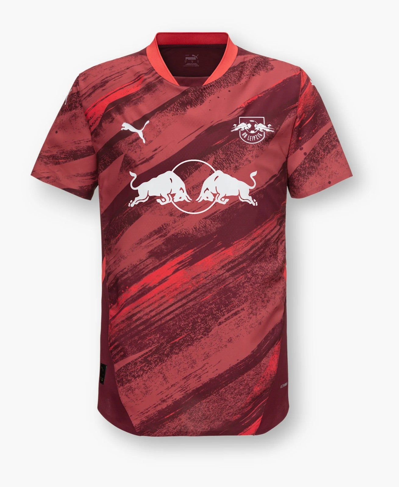 Fo0CPrUuejoQhya | UAE SPORT STORE Red and maroon striped Puma RB Leipzig football jersey featuring a white crest and two charging bulls logo on the chest.