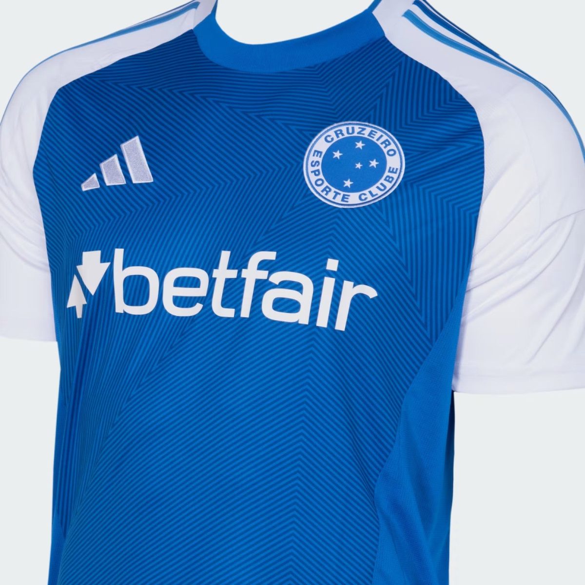 Blue Cruzeiro Esporte Clube jersey with white sleeves, Adidas logo, and Betfair sponsor text on the chest.