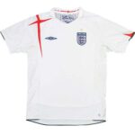 White England football jersey with crest and Umbro logo, front view, short sleeves with red accent.
