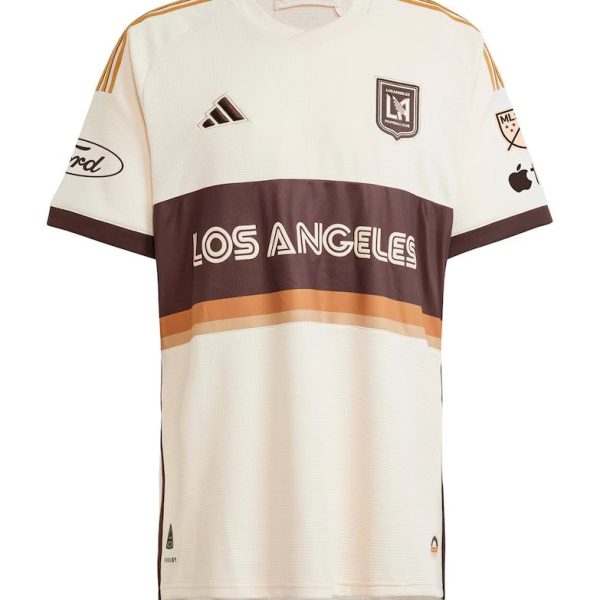 Cream Los Angeles FC soccer jersey with a brown chest band reading ‘LOS ANGELES’, orange stripe accents and team crest on the left chest.