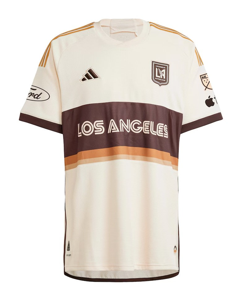 GWzlDhQZH67R7BT Cream Los Angeles FC soccer jersey with a brown chest band reading โLOS ANGELESโ, orange stripe accents and team crest on the left chest.