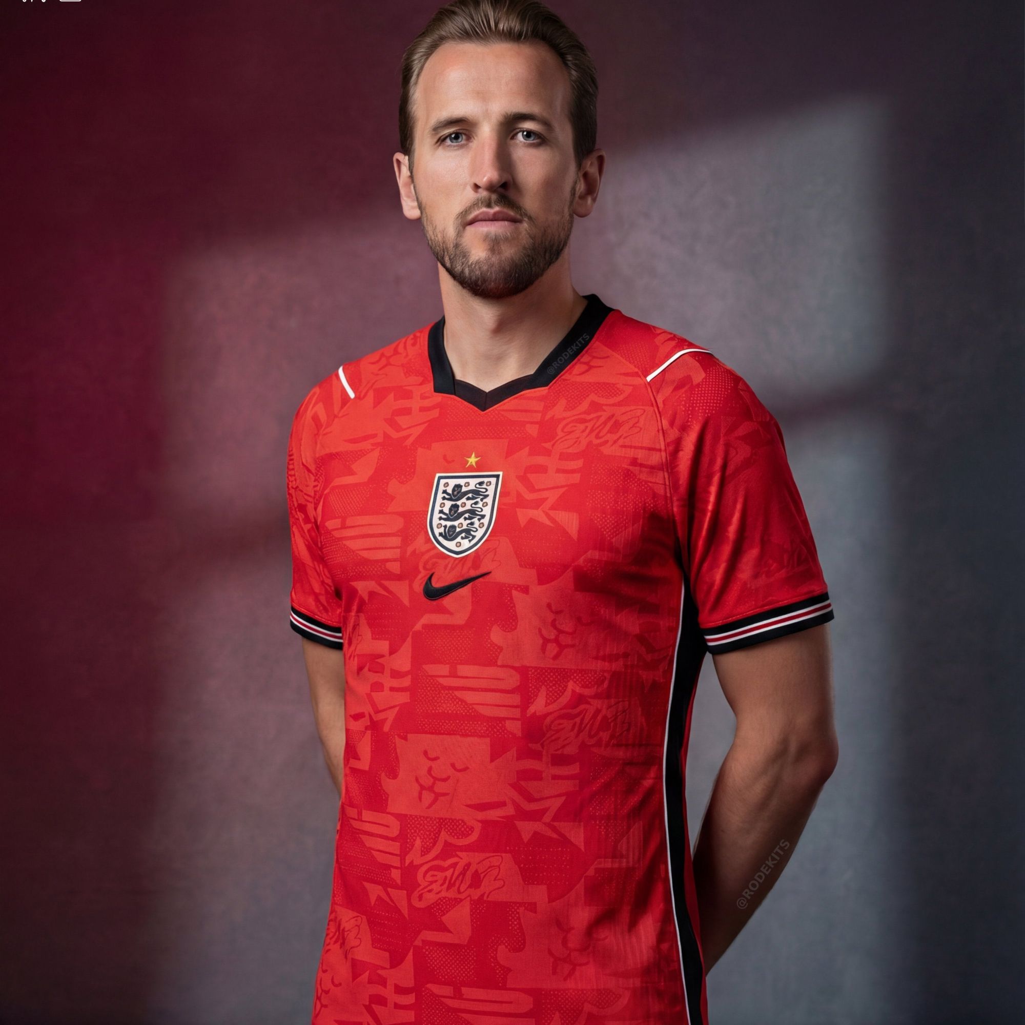 G_7O7WAX0AA31jf | UAE SPORT STORE Portrait of a man wearing a red England football jersey, facing the camera with a neutral expression against a dark gradient background
