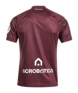Maroon training jersey shown from the back with a white emblem above the sponsor text near the lower back reading ACROBATICA and a small badge on the left sleeve arm edge.