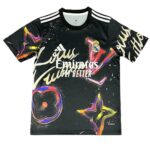 GmzYWuDWwAAs0zv | UAE SPORT STORE Black Real Madrid football jersey with colorful graffiti graphics and white 'Fly Emirates' text and striped shoulders.