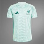 H9FDGYiEQ3p0wOD | UAE SPORT STORE Mint green Mexico national soccer team jersey with an intricate white geometric pattern and team crest on the chest. Adidas logo visible on the other side.