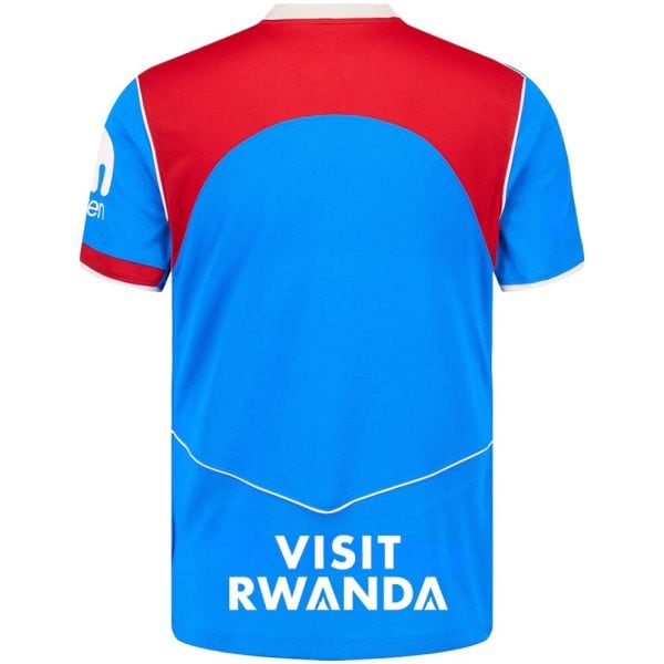 Back view of a blue and red sports jersey with white piping and the text 'VISIT RWANDA' at the hem.