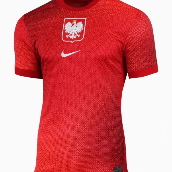 Red Poland national team jersey featuring a white eagle crest on the chest and a white Nike swoosh.