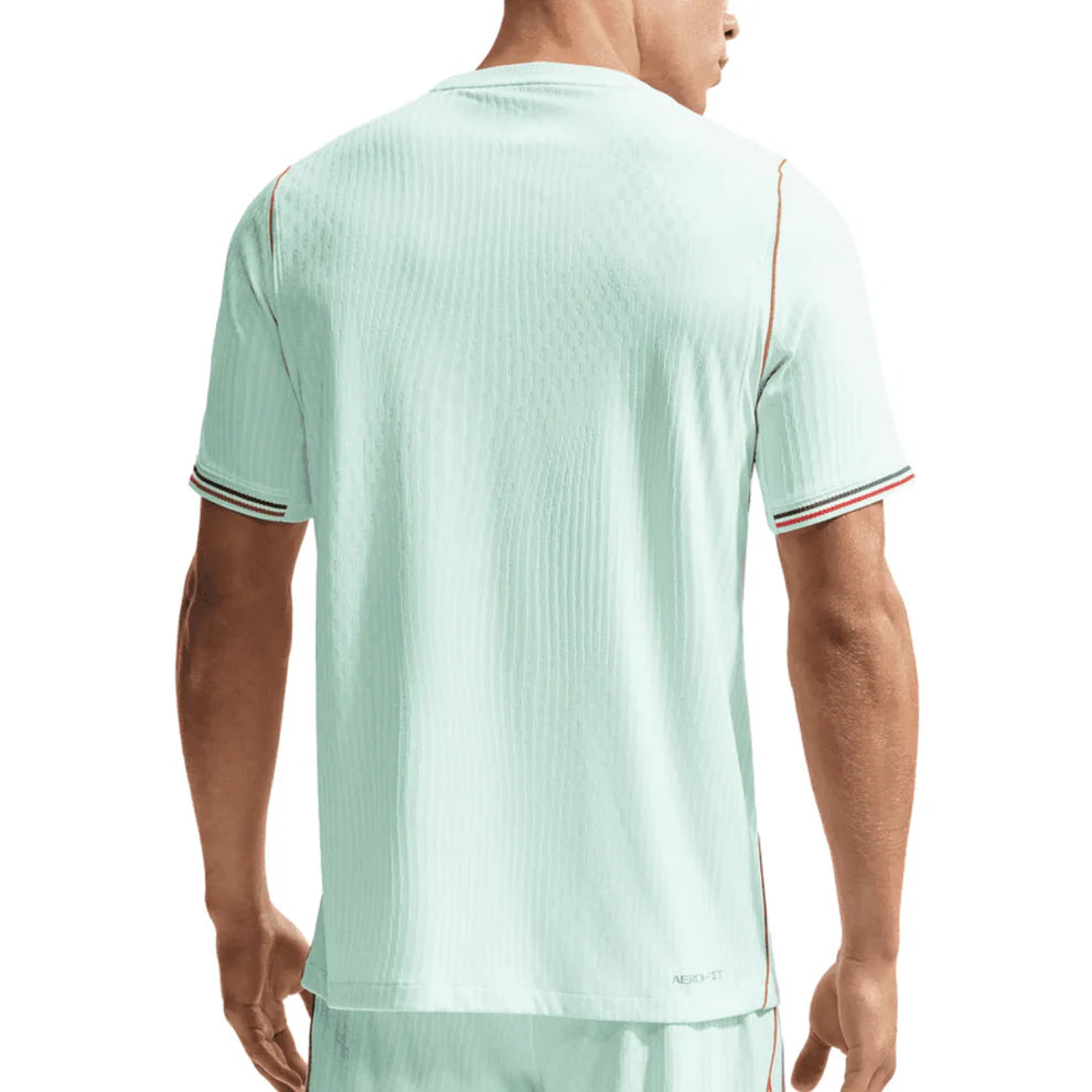 IB5200-394_2 | UAE SPORT STORE Back view of a mint green athletic jersey with short sleeves and striped cuffs, showing a textured fabric pattern.