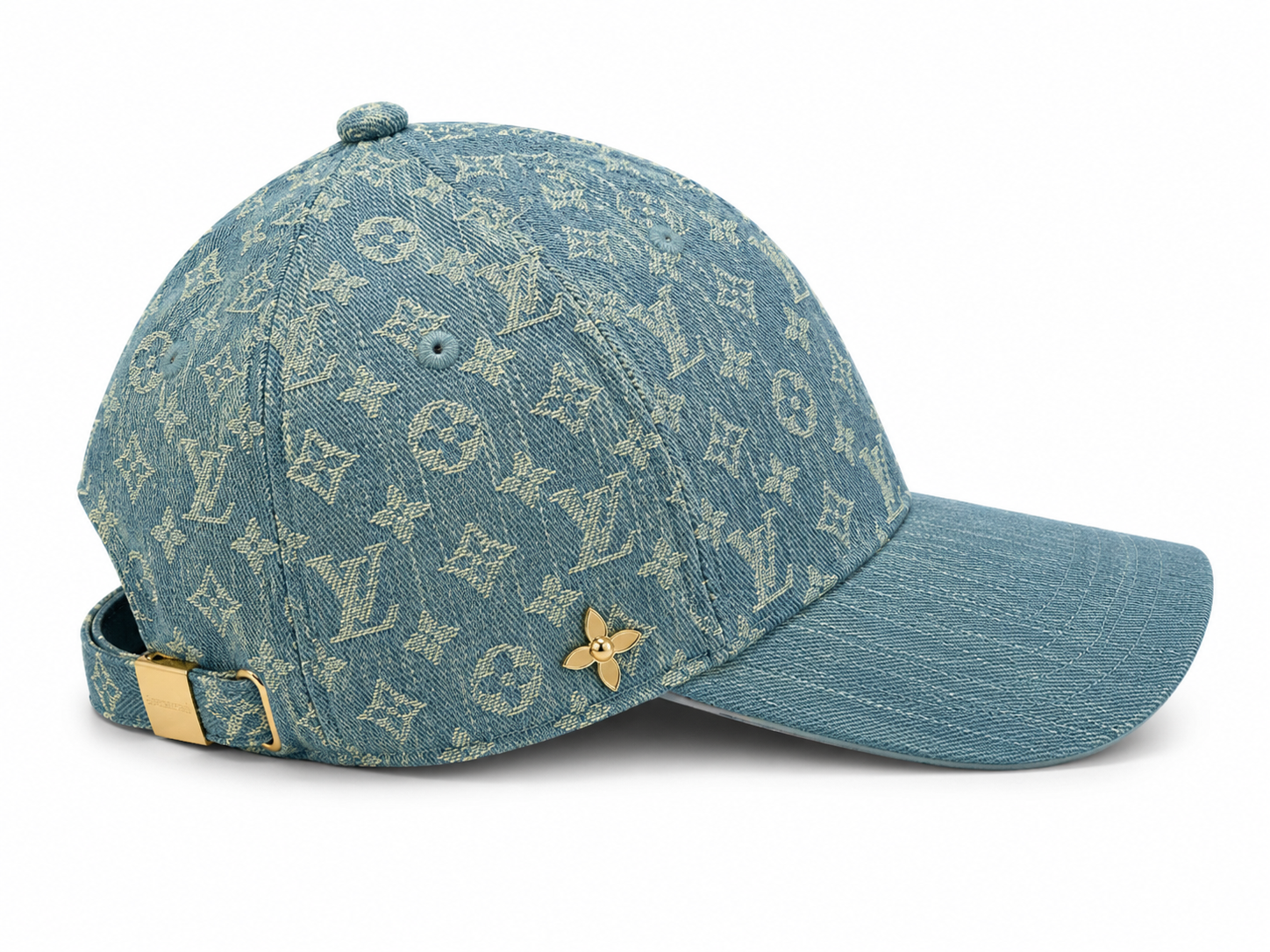 IMG-2053 | UAE SPORT STORE Denim cap with Louis Vuitton monogram pattern, gold back strap buckle, and small gold flower pin edge detail.