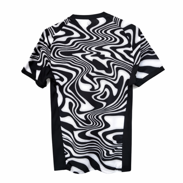 Black-and-white short-sleeve t-shirt with bold swirling optical pattern.