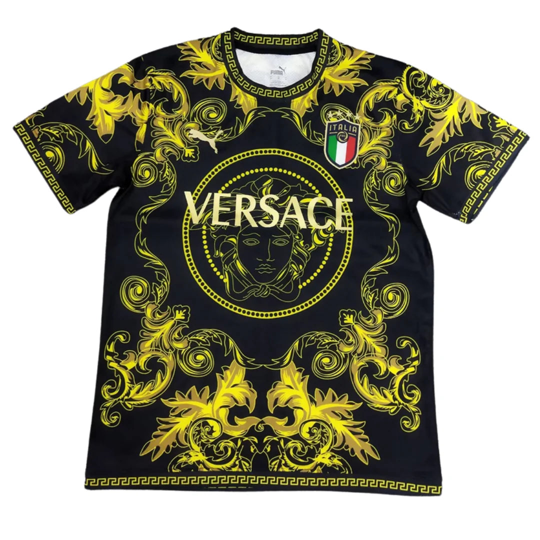 Italy23-24PumaXVersaceEditionYellow_1024x1024_2x_2739101c-ddad-4cea-bbc2-9961b9b26f1b Black Versace T-shirt with a vivid yellow baroque pattern, Medusa emblem in a circle, and 'VERSACE' text across the chest.