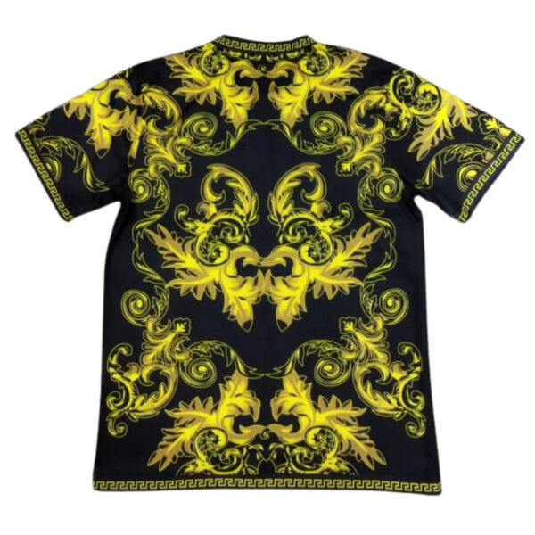 Black T-shirt with ornate gold baroque pattern and Greek key border on edges.