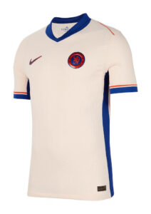 Cream Chelsea FC away jersey with blue V-neck collar, blue piping, and crest on the left chest; Nike swoosh on the right.