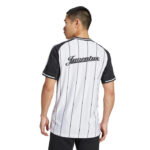 Man wearing a white and black pinstripe Juventus jersey, shown from the back