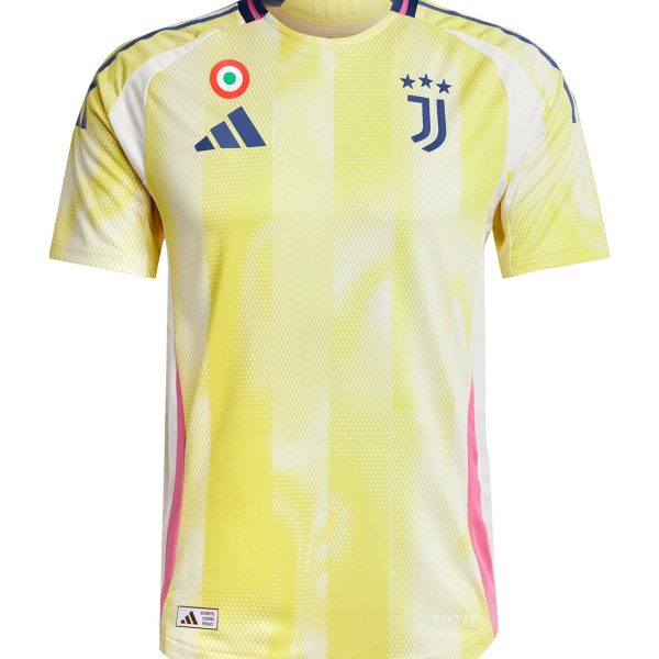 Juventus away football jersey in yellow with blue Adidas logo and club crest (three stars) on the chest, pink side panels visible on the sides.