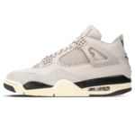 Side view of a light gray athletic sneaker with mesh panels and a visible air cushioning unit.