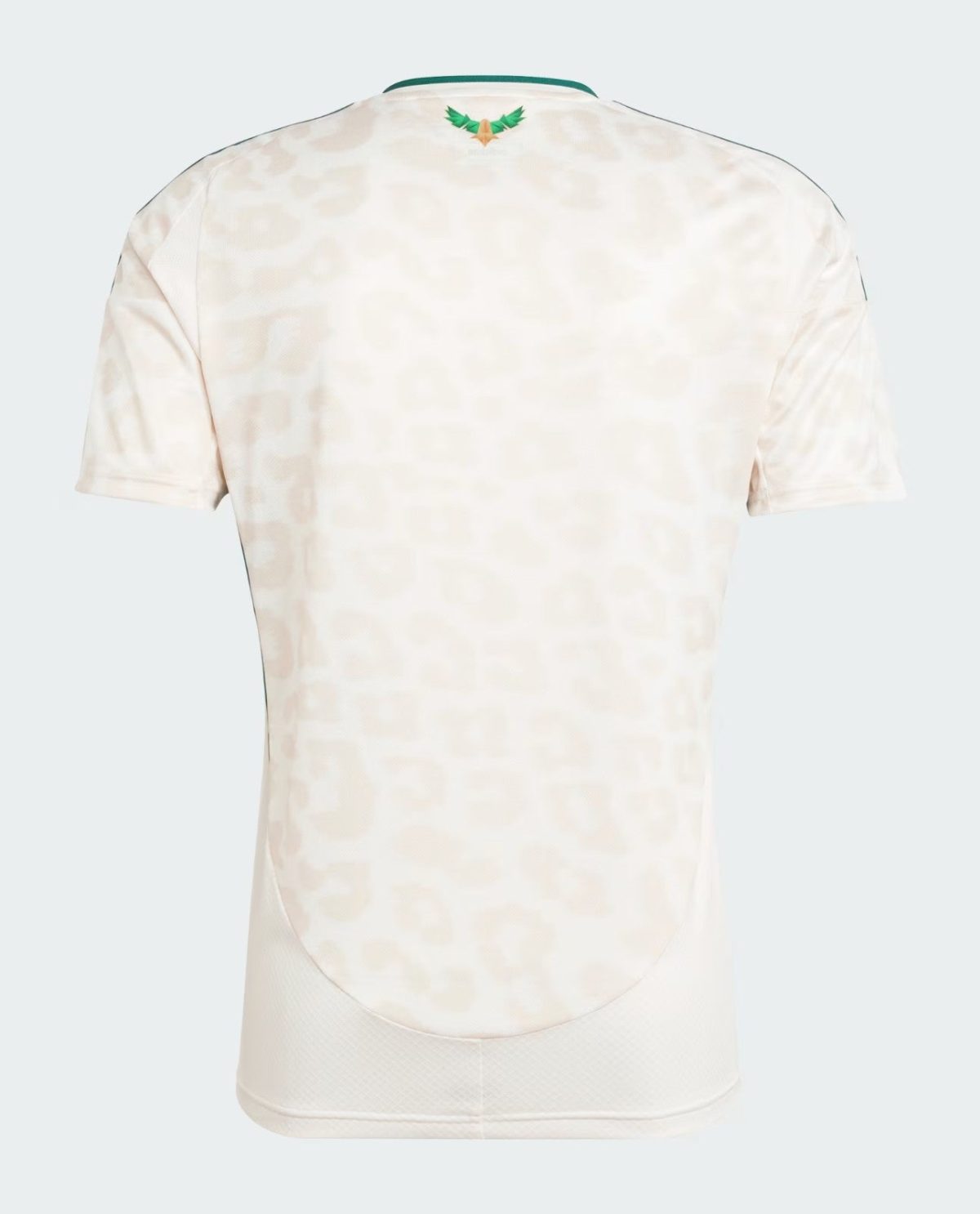 Back view of a pale, patterned polo shirt with a small green-and-orange emblem at the collar.