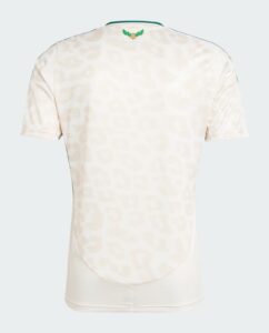 Back view of a pale, patterned polo shirt with a small green-and-orange emblem at the collar.