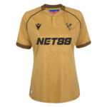 Gold soccer jersey with black geometric pattern, NET88 sponsor, crest on left chest.