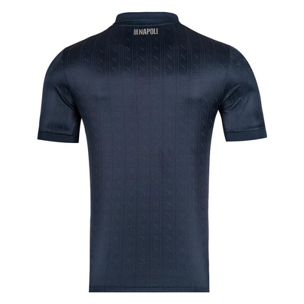 Navy blue short-sleeve polo shirt viewed from the back with a subtle vertical stripe pattern and Napoli logo near the collar.