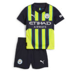 Child-sized Manchester City away kit: navy jersey with neon yellow vertical stripes, Etihad Airways sponsor, club crest; navy shorts with crest and Puma logo.